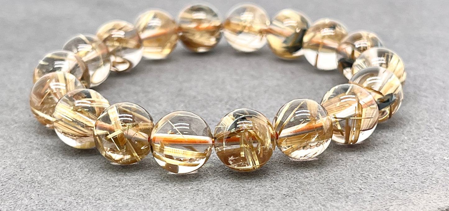 Golden Rutilated Quartz AAA Bracelet 10mm